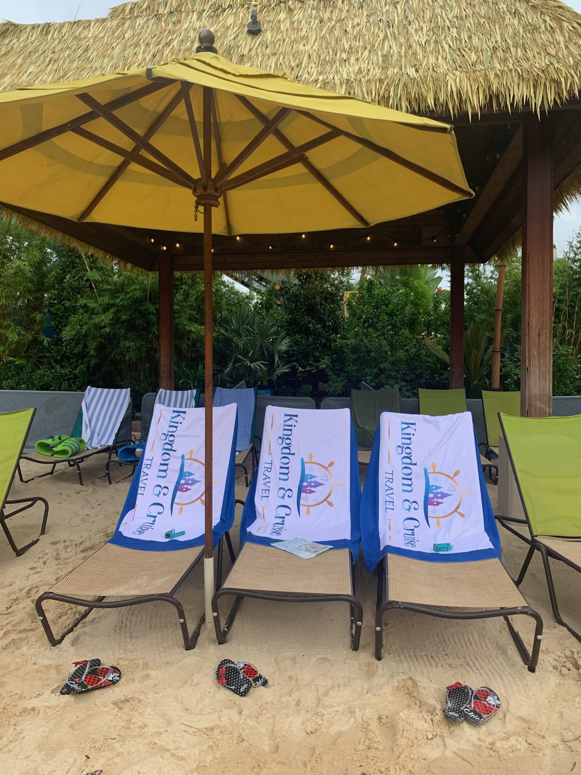 Beach chairs with Kingdom and Cruise towels on them