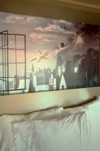 Hidden Peter Pan artwork revealed behind the Murphy bed in a Tower Studio at Disney's Riviera Resort